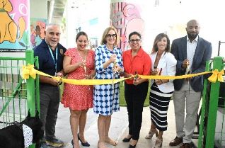 Commissioner Eileen Higgins and staff ribbon cutting