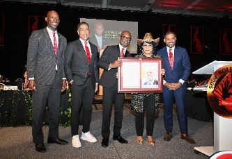 Kionne L. McGhee with Congresswoman Frederica Wilson and other toastmasters