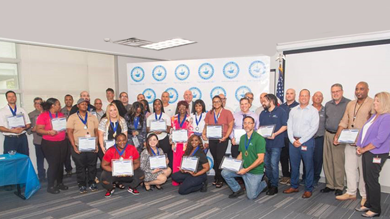 image of waste management team who were awarded pebble program awards