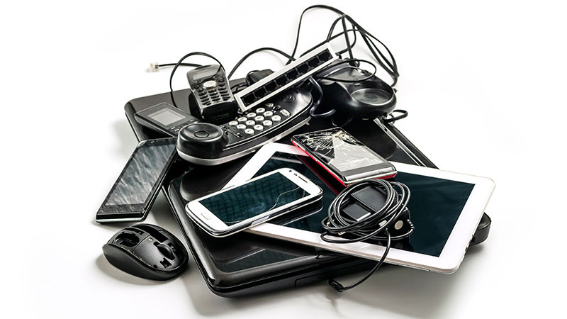 pile of used electronics